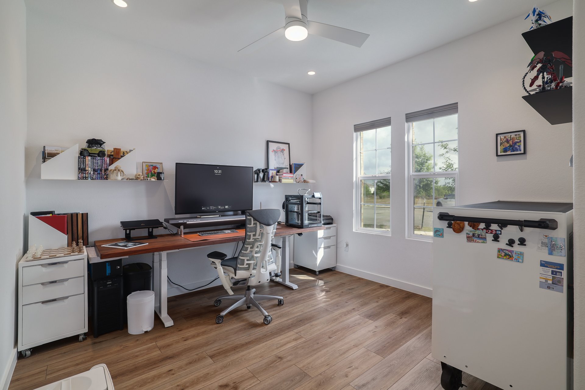 411 Jack Ryan Kyle, TX 78640 - Photo 7 of 30 a view of a workspace with furniture and a window