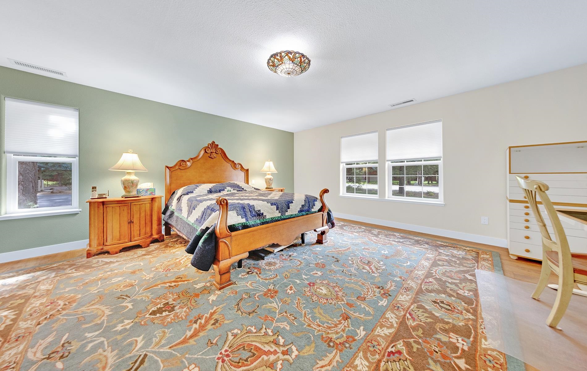 650 Wagon Road Chester, CA 96020 - Photo 11 of 36 a bedroom with a bed and a window