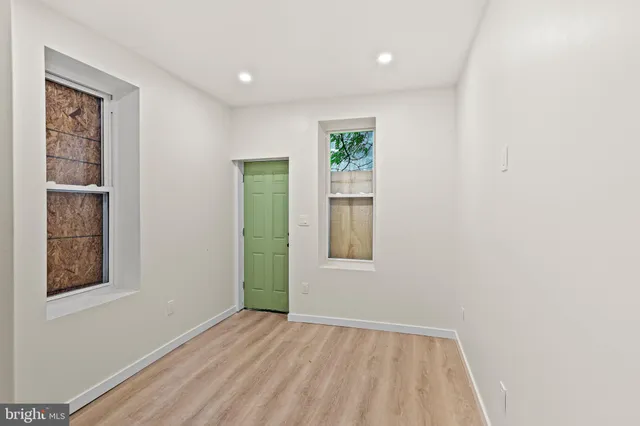 an empty room with windows