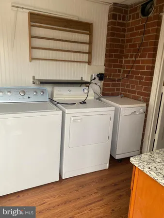 a utility room with washer and dryer
