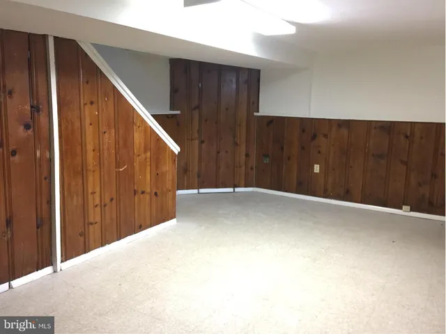 a view of kitchen with furniture and window