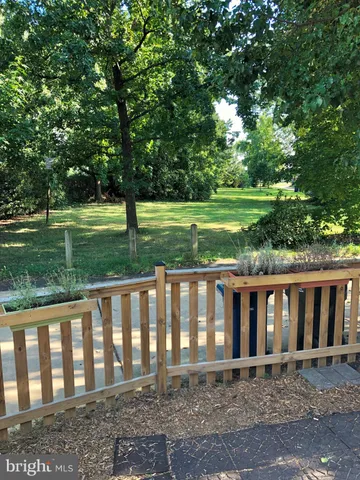 a view of a wooden deck yard