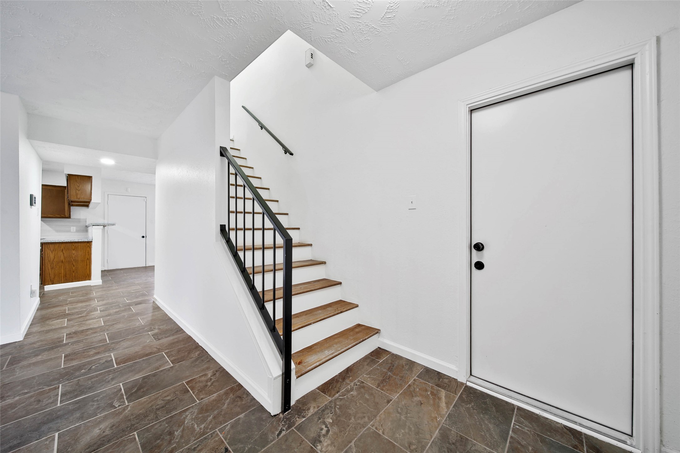22214 Meadowhill Drive Spring, TX 77389 - Photo 3 of 13 a view of a hallway view with staircase
