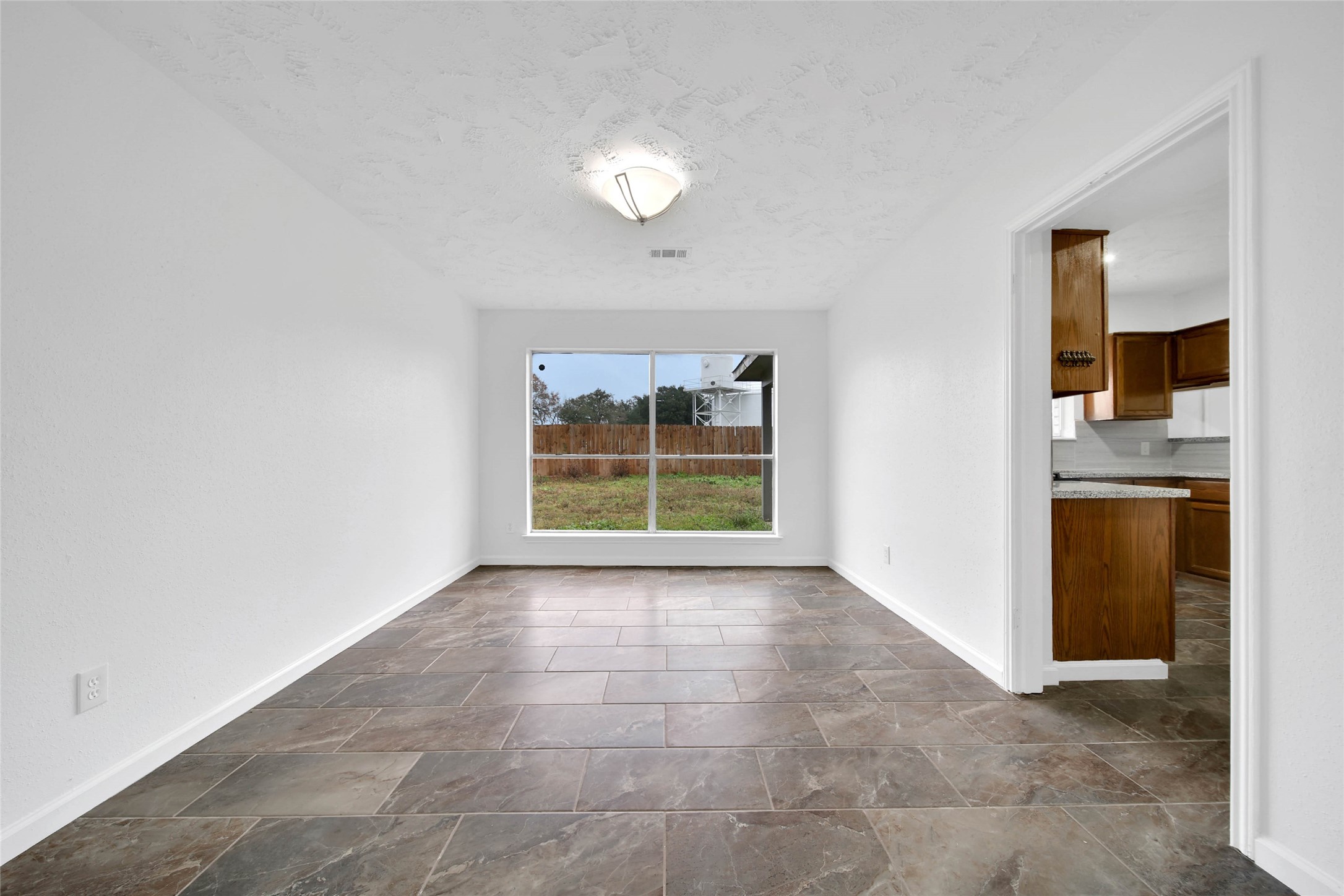 22214 Meadowhill Drive Spring, TX 77389 - Photo 6 of 13 a view of an empty room with a window