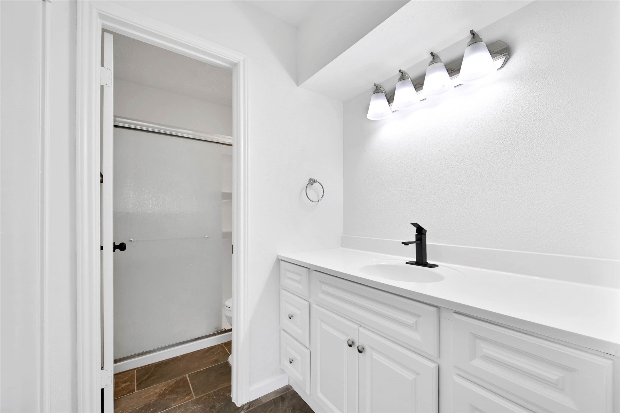 22214 Meadowhill Drive Spring, TX 77389 - Photo 10 of 13 a bathroom with a sink and mirror