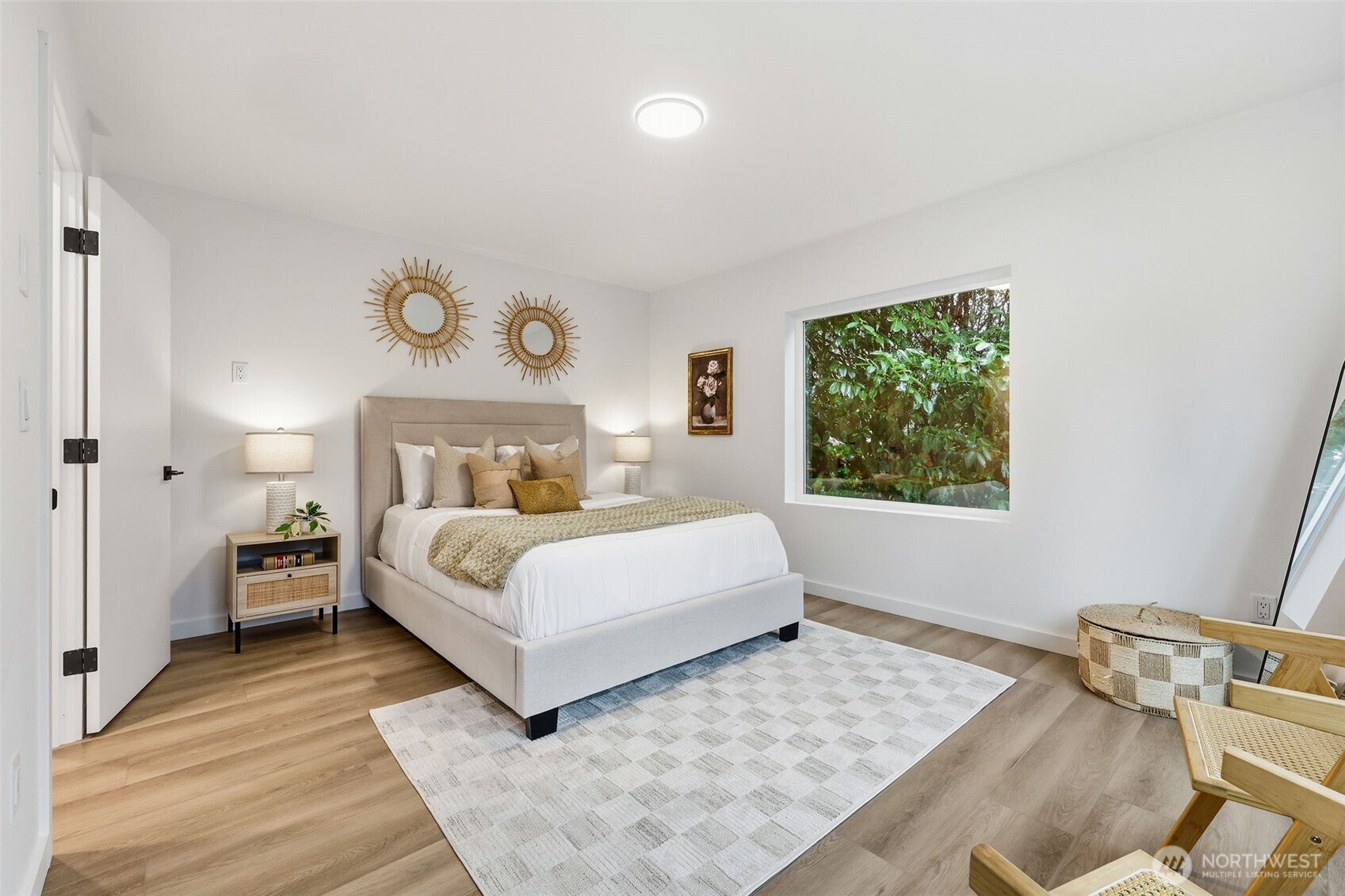 14304 1st Avenue Northwest Seattle, WA 98133 - Photo 11 of 18 a bedroom with a bed and a window