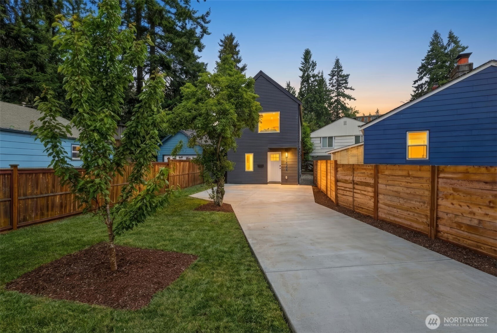 14304 1st Avenue Northwest Seattle, WA 98133 - Photo 2 of 18 a front view of a house with a yard