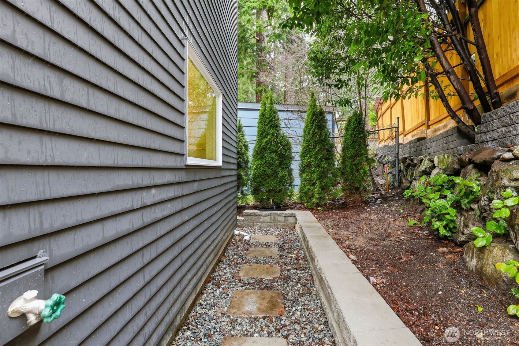 14304 1st Avenue Northwest Seattle, WA 98133 - Photo 5 of 18 a view of a pathway with a garden