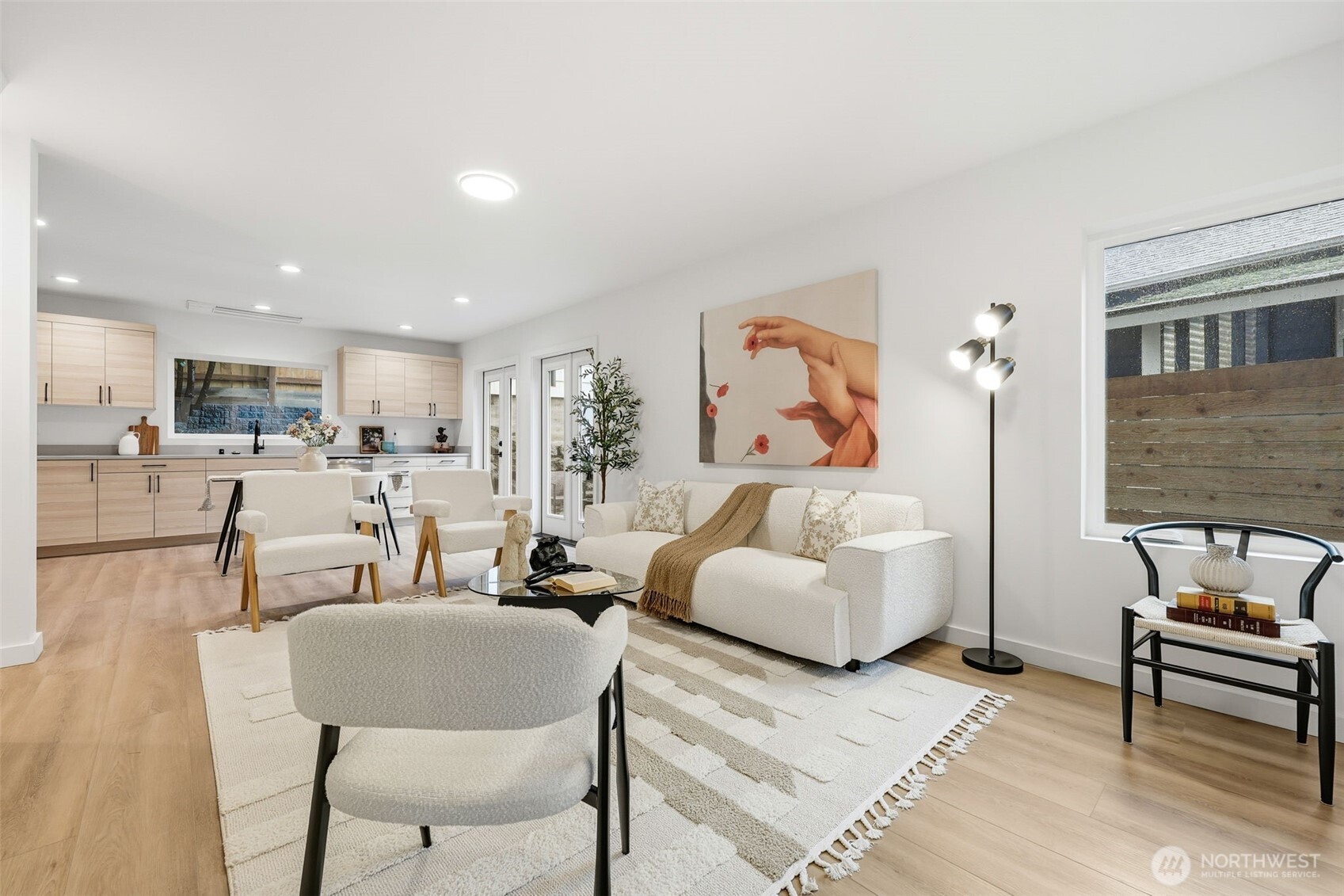 14304 1st Avenue Northwest Seattle, WA 98133 - Photo 7 of 18 a living room with furniture and view of kitchen