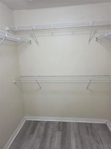 a view of a room with racks on the wall