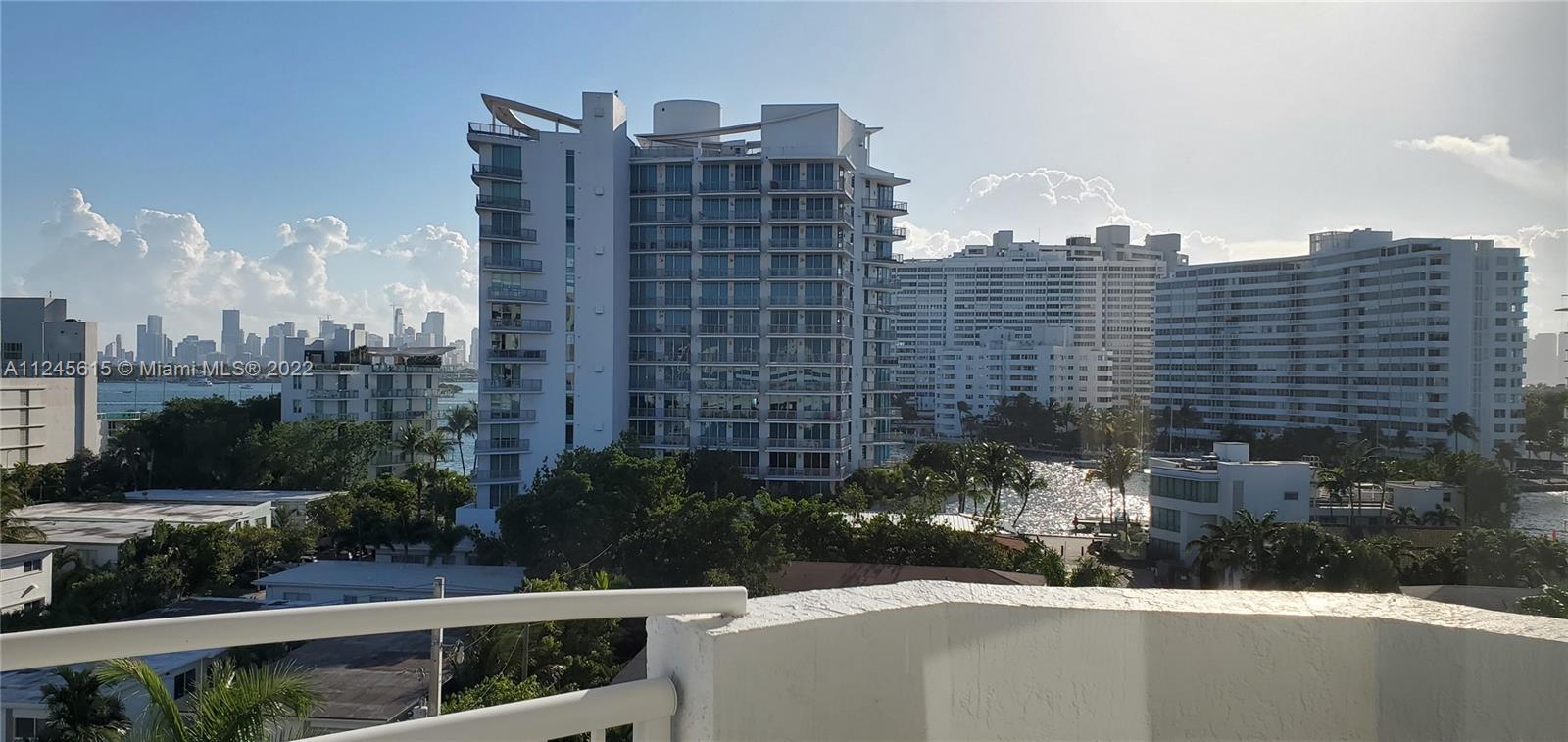 1621 Bay Road, Unit 708 Miami Beach, FL 33139 - Photo 1 of 20 a view of a city with tall buildings