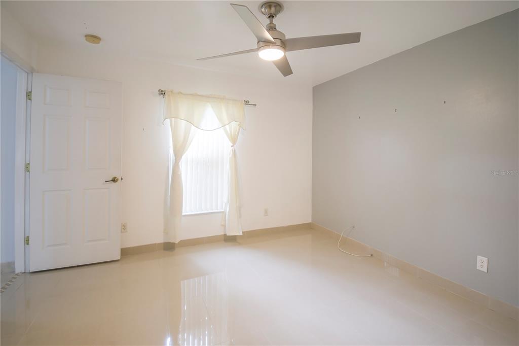 4913 Cromey Road North Port, FL 34288 - Photo 23 of 36 wooden floor in an empty room