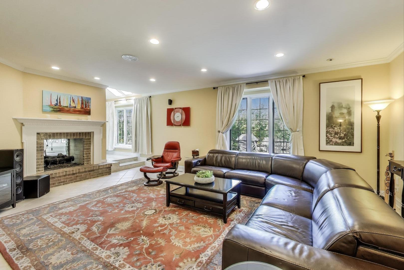 1920 Wedgewood Drive Lake Forest, IL 60045 - Photo 13 of 53 a living room with furniture and a fireplace