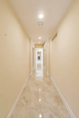 a view of a livingroom with furniture window and wooden floor