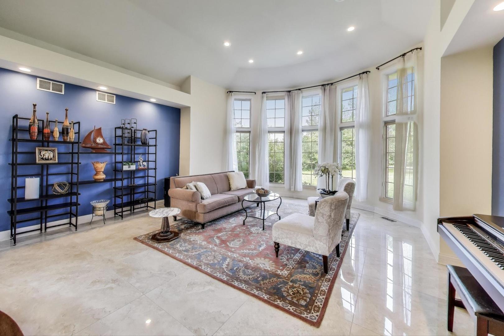 1920 Wedgewood Drive Lake Forest, IL 60045 - Photo 4 of 53 a living room with furniture and a large window