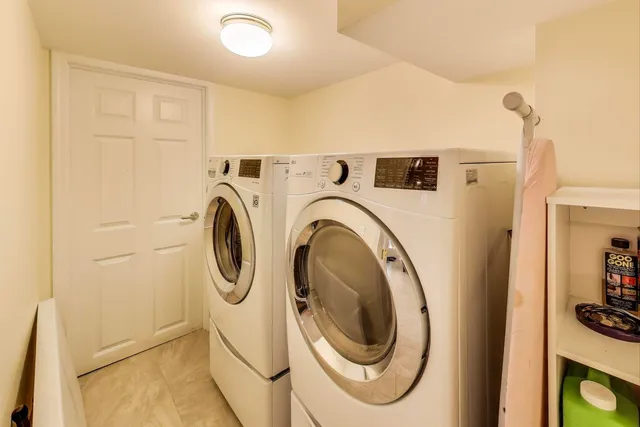 a big yard with lots of green space and plants