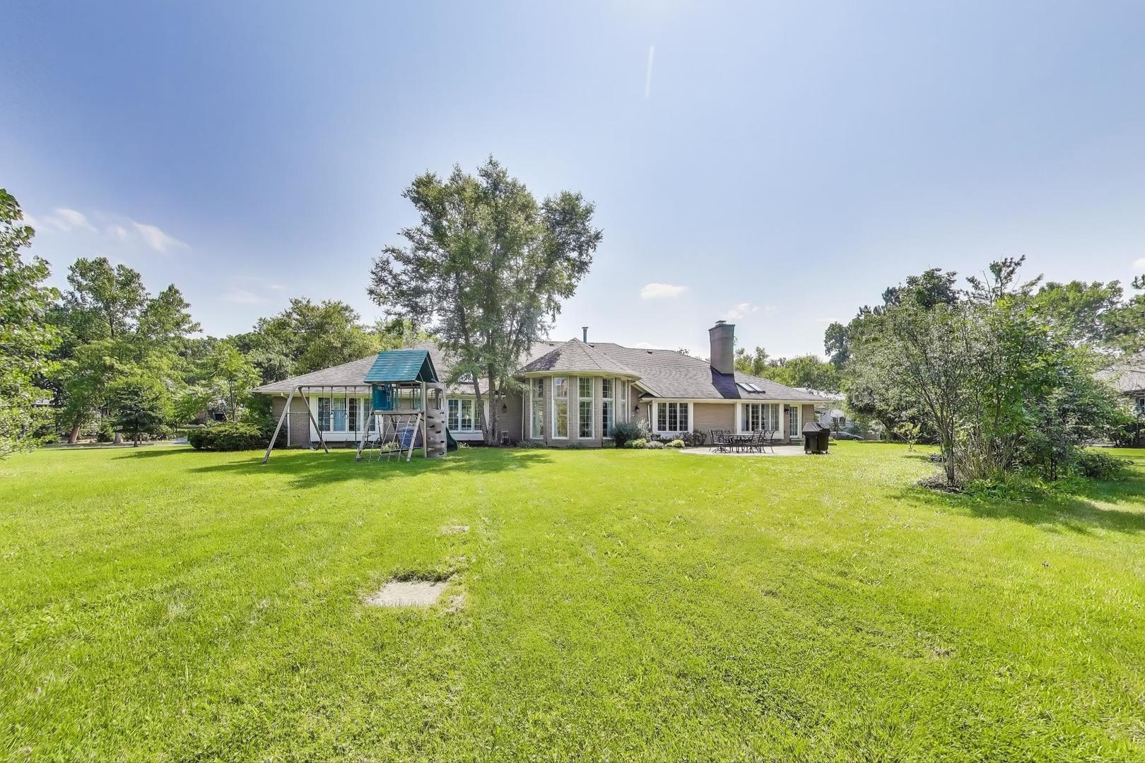 1920 Wedgewood Drive Lake Forest, IL 60045 - Photo 51 of 53 a front view of a house with a big yard