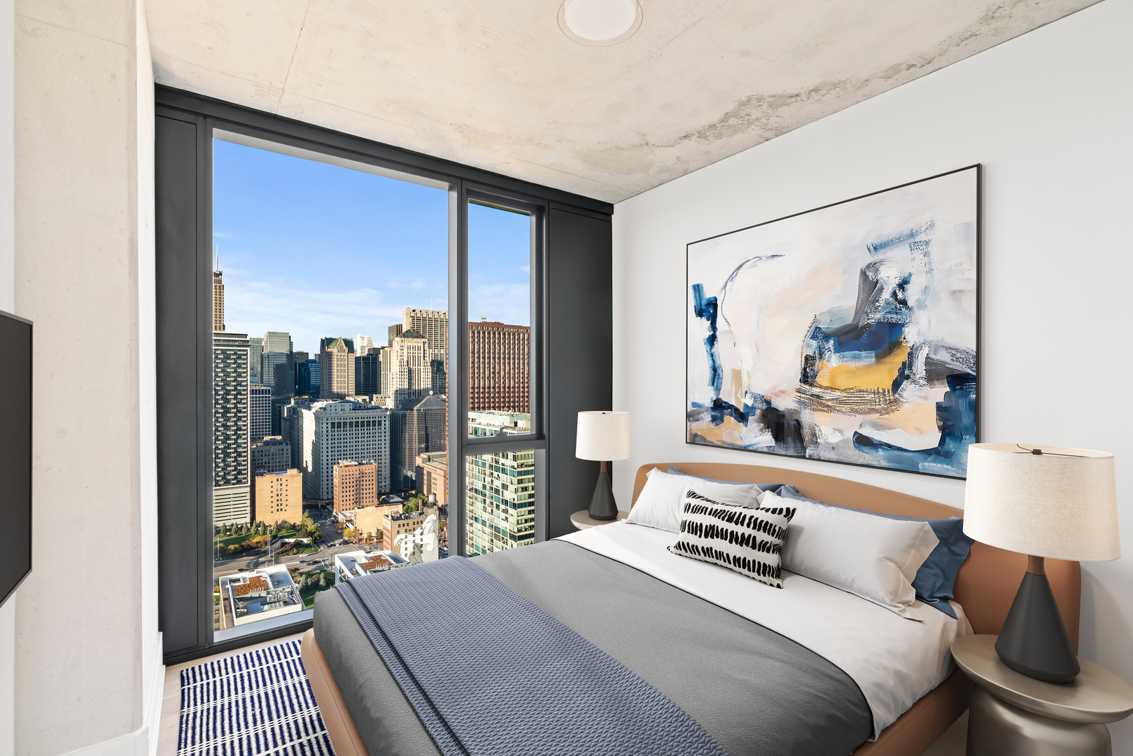 234 West Polk Street, Unit 3708 Chicago, IL 60605 - Photo 11 of 33 a bedroom with a bed and wooden floor