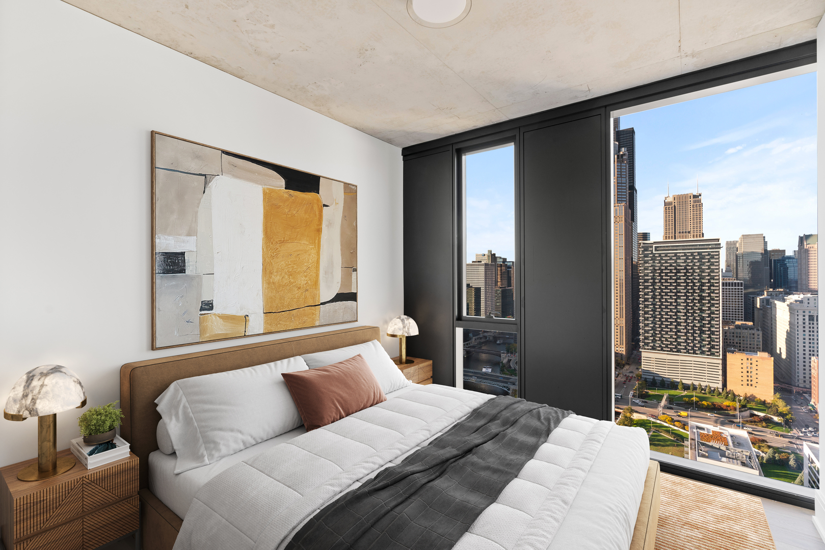 234 West Polk Street, Unit 3708 Chicago, IL 60605 - Photo 6 of 33 a bedroom with a large bed and a flat tv screen