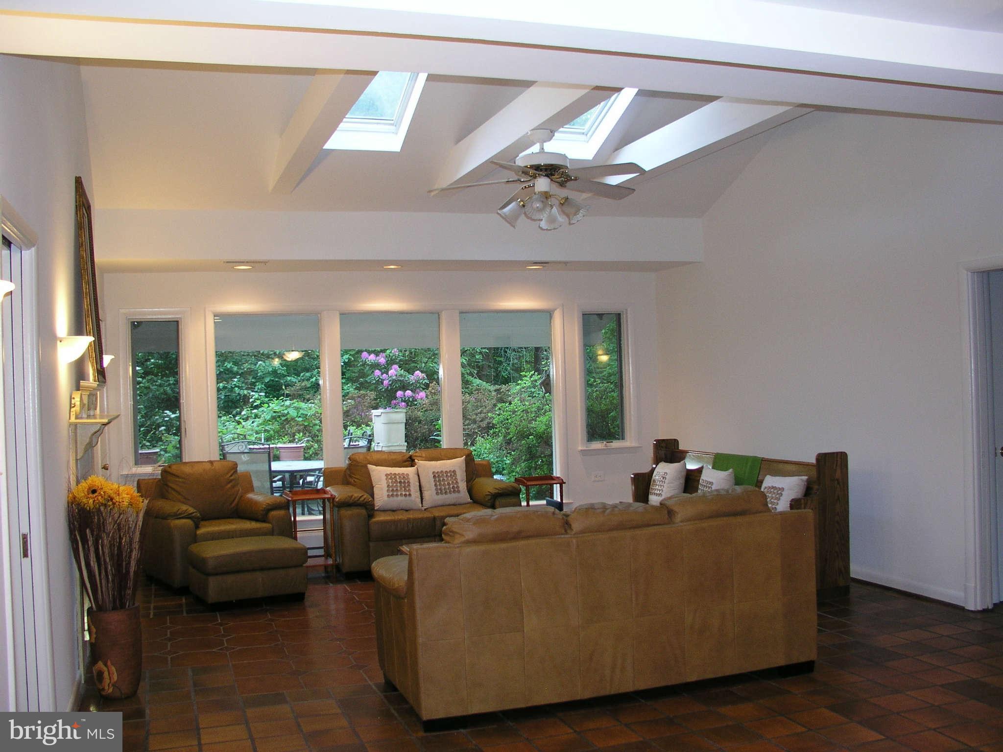 10409 Gary Road, Unit FRONT Potomac, MD 20854 - Photo 7 of 14 a living room with furniture and a large window