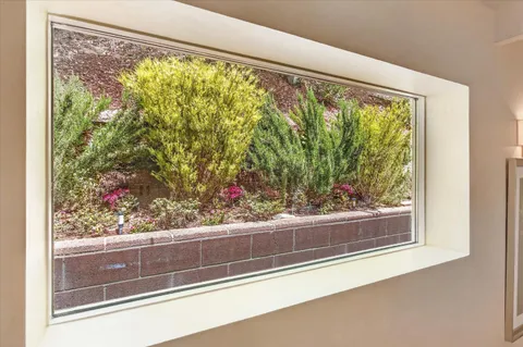 a view of a backyard with sitting area and furniture