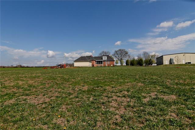 1061 Ferrells Loop Road Manchester, TN 37355 - Photo 4 of 15 Another view of back of home from further back on the property....5 acres cleared & 5 acres wooded