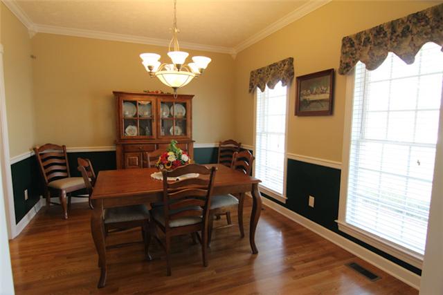 1061 Ferrells Loop Road Manchester, TN 37355 - Photo 10 of 15 Formal dining room with hardwood floors