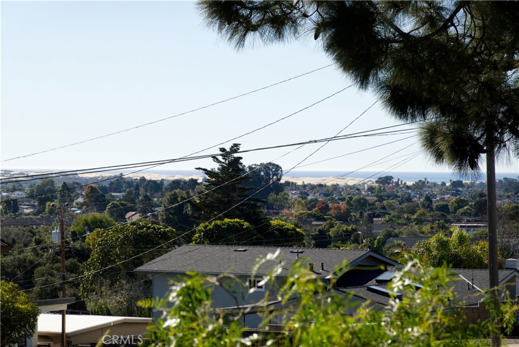 171 Brisco Road, Unit 6 Arroyo Grande, CA 93420 - Photo 11 of 12 an aerial view of residential house with pool and yard