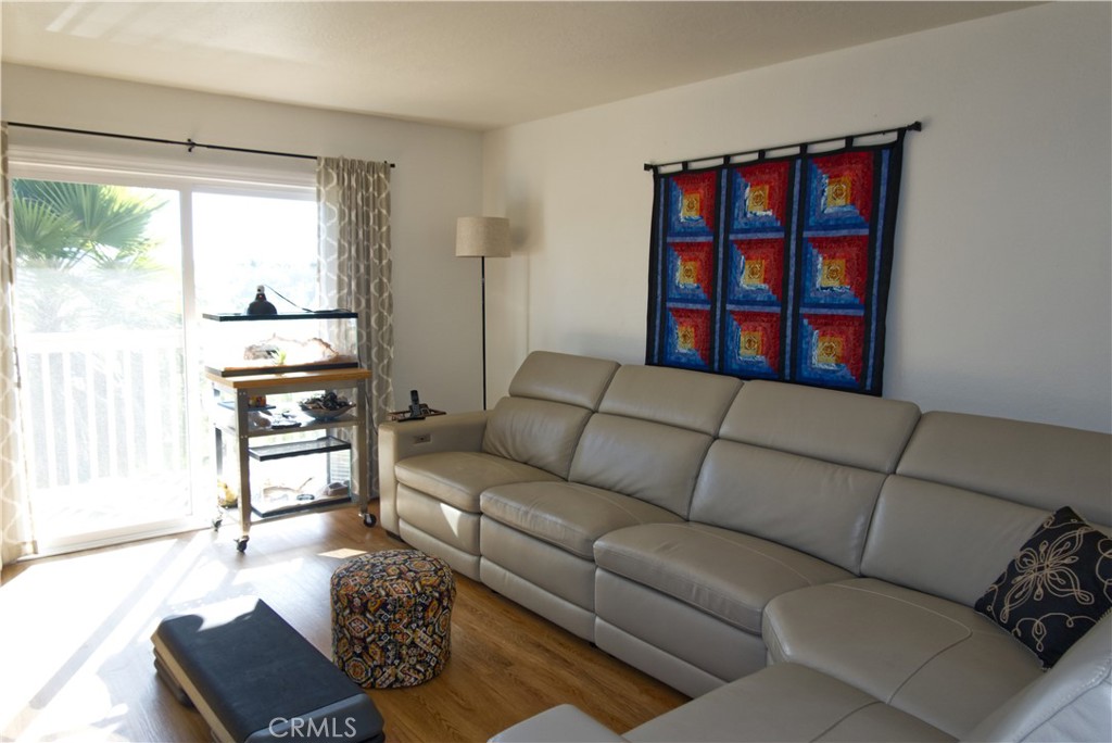 171 Brisco Road, Unit 6 Arroyo Grande, CA 93420 - Photo 2 of 12 a living room with furniture and a window