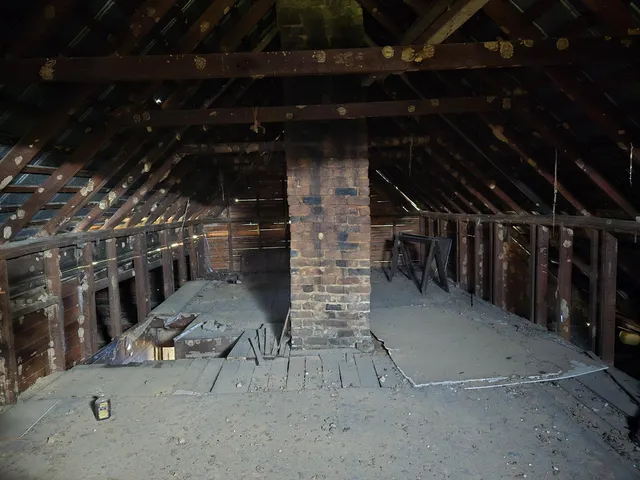 a room with furniture and a window