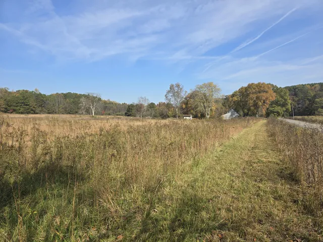 a view of mountain with lake view
