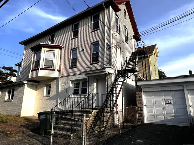 a front view of a house with balcony