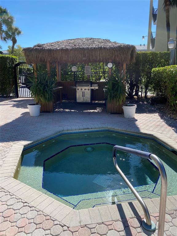 5300 Northeast 24th Terrace, Unit 211C Fort Lauderdale, FL 33308 - Photo 17 of 23 a view of swimming pool