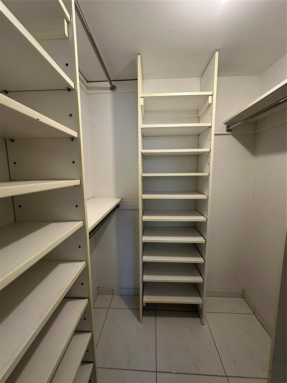 5300 Northeast 24th Terrace, Unit 211C Fort Lauderdale, FL 33308 - Photo 23 of 23 a view of walk in closet with empty racks