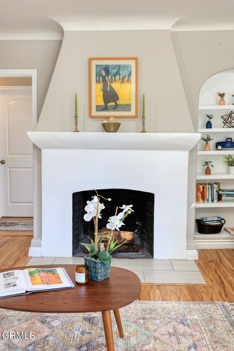 2116 Summit Avenue Altadena, CA 91001 - Photo 11 of 31 a living room with furniture and a fireplace
