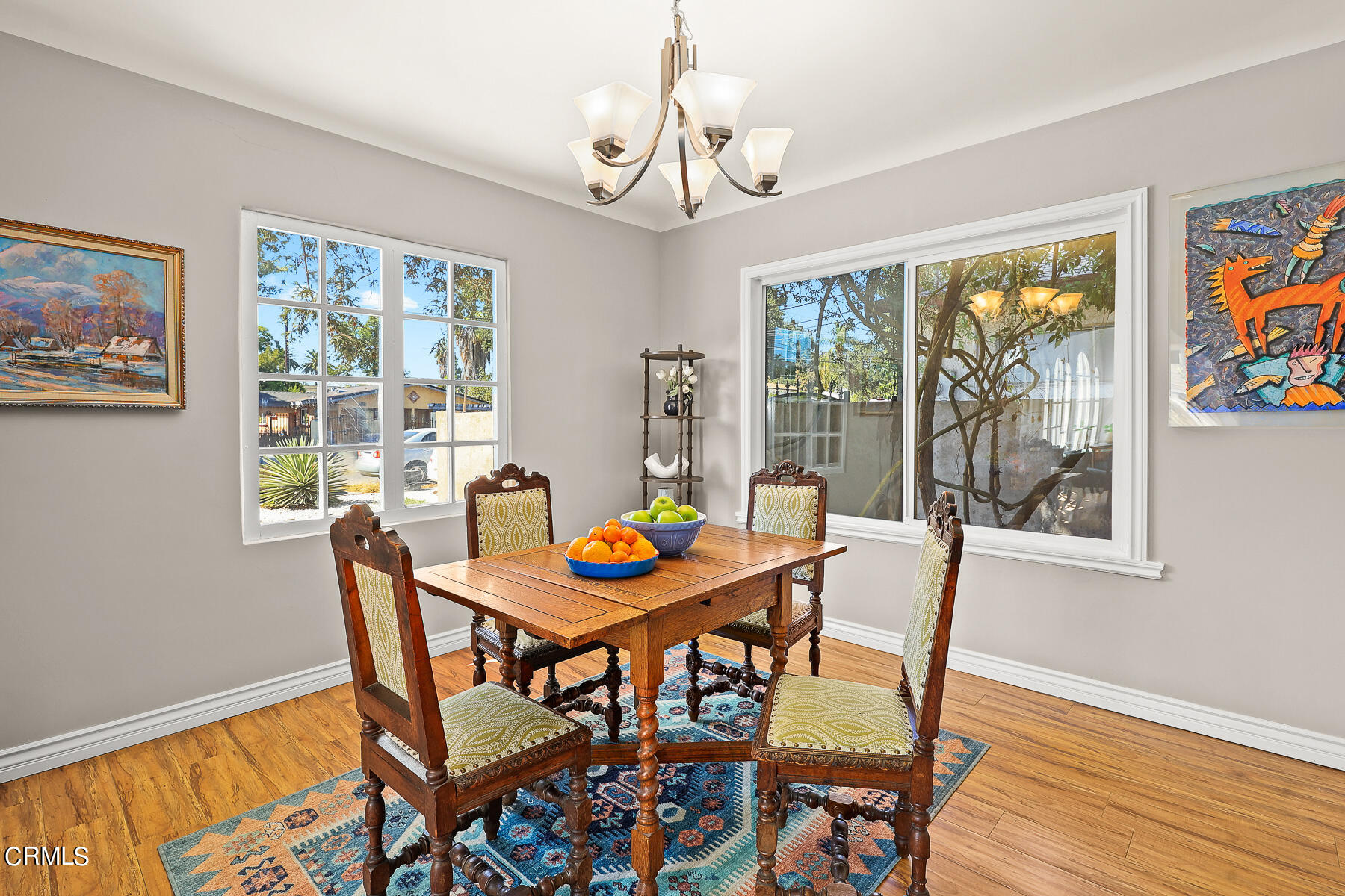 2116 Summit Avenue Altadena, CA 91001 - Photo 15 of 31 a dining room with furniture a rug and wooden floor