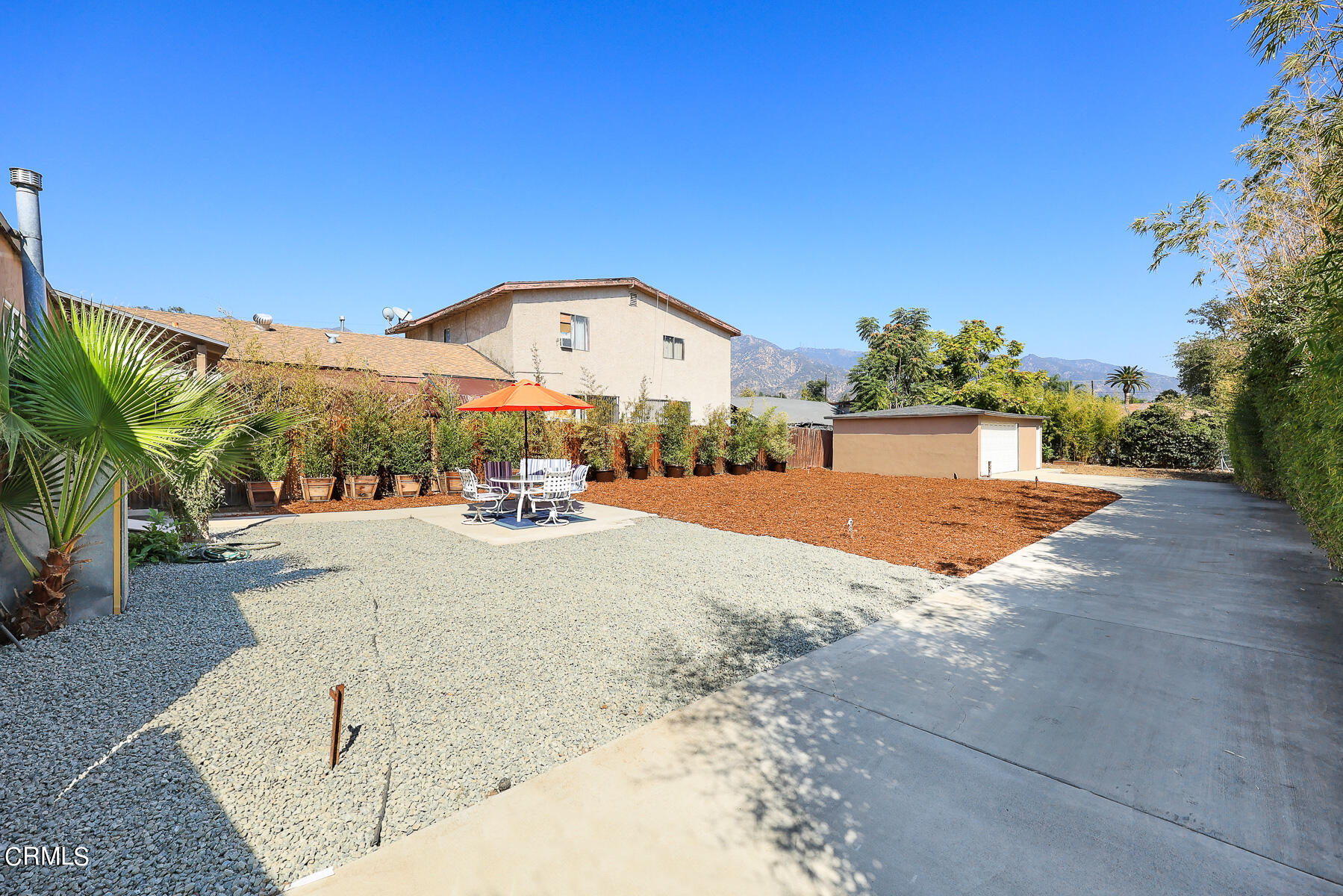 2116 Summit Avenue Altadena, CA 91001 - Photo 29 of 31 a view of a house with a yard