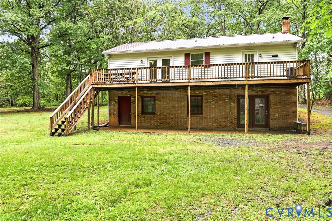 3220 Greenway Road Gladstone, VA 24553 - Photo 2 of 29 a front view of a house with a yard