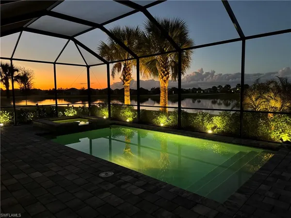a view of a swimming pool with a porch