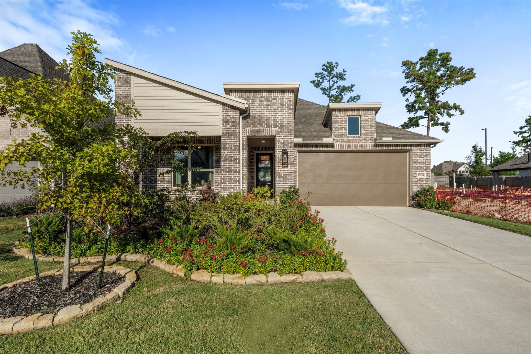 15650 Turtlehead Trail Conroe, TX 77302 - Photo 2 of 41 a front view of a house with a yard