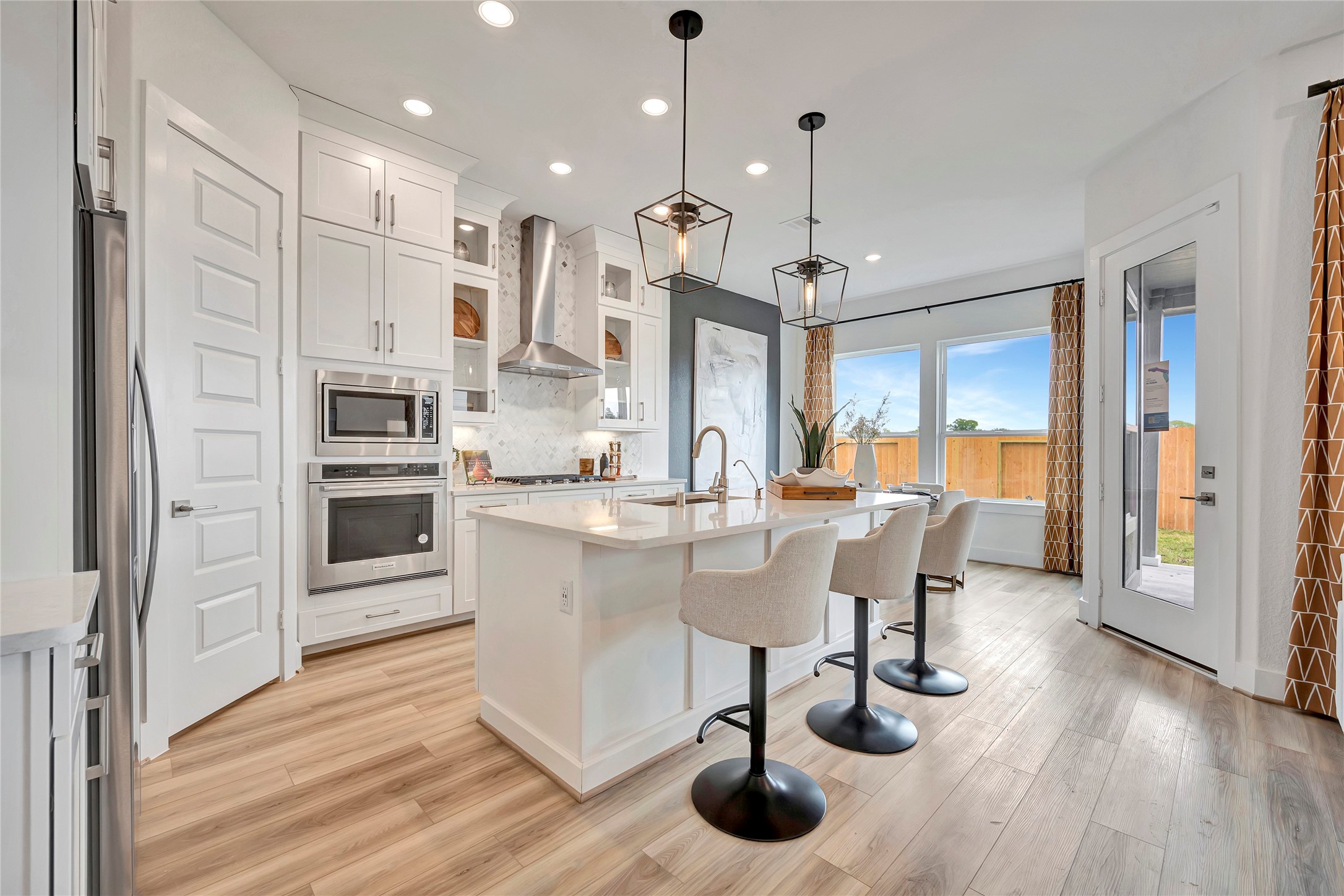 22651 Rice Flower Way Katy, TX 77449 - Photo 1 of 30 Photo is not of the actual home, but is an inspirational photo of builder’s model home and may depict options, furnishings, and/or decorator features that are not included