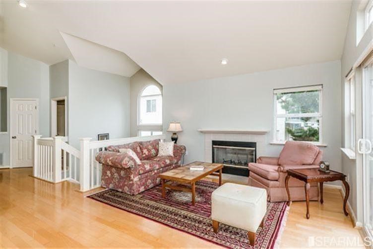 544 Monterey Road Pacifica, CA 94044 - Photo 8 of 10 a living room with furniture and a fireplace