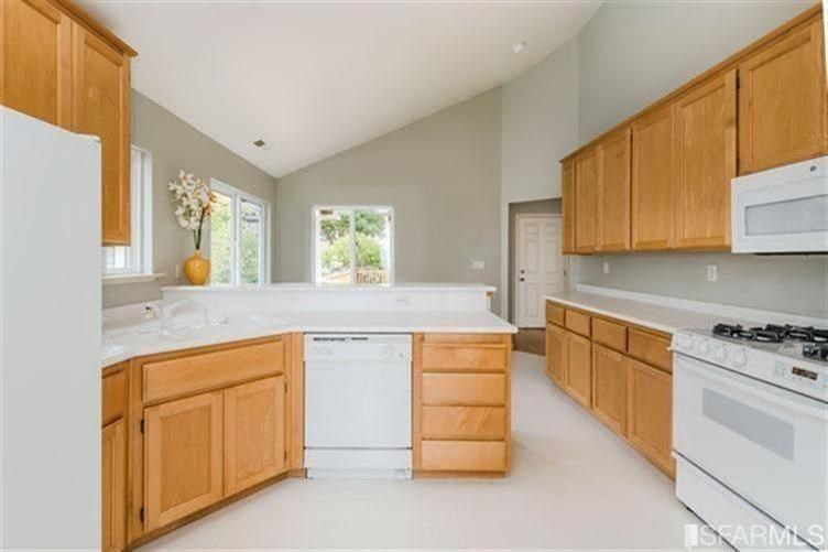 544 Monterey Road Pacifica, CA 94044 - Photo 10 of 10 a kitchen with white cabinets and sink