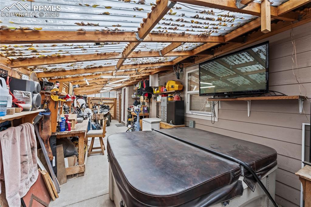 521 Brookside Street Colorado Springs, CO 80905 - Photo 18 of 27 a view of a room with wooden floor