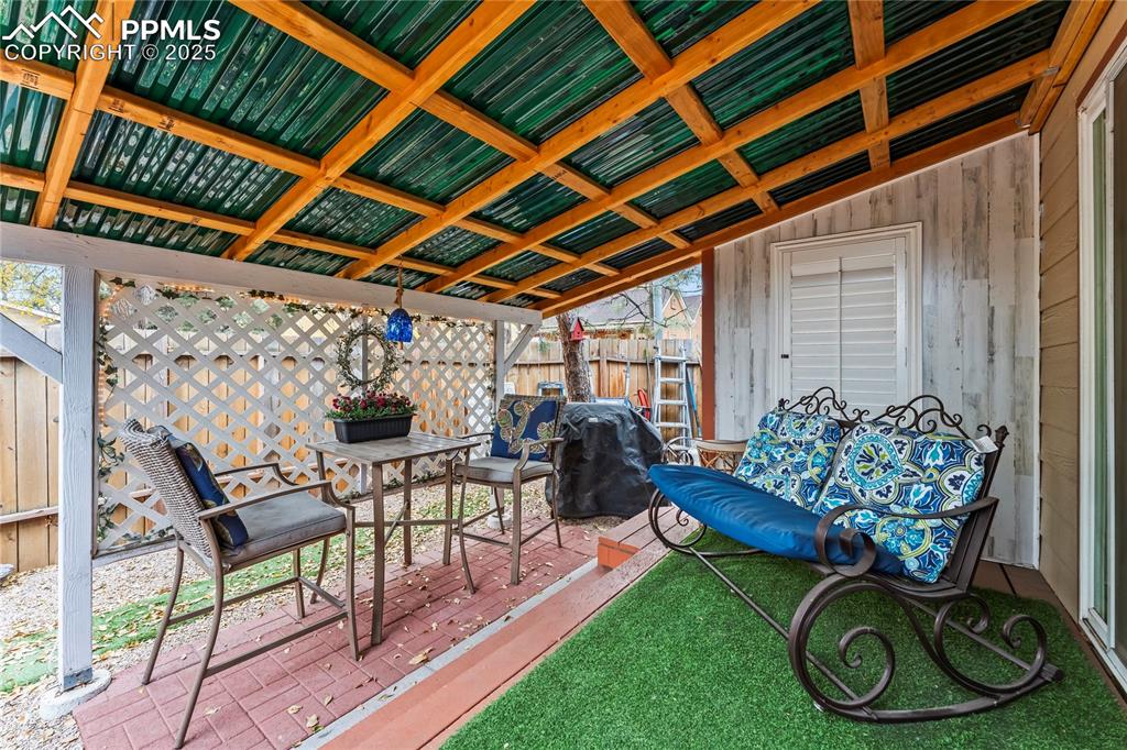 521 Brookside Street Colorado Springs, CO 80905 - Photo 20 of 27 a view of a chairs and table in a patio