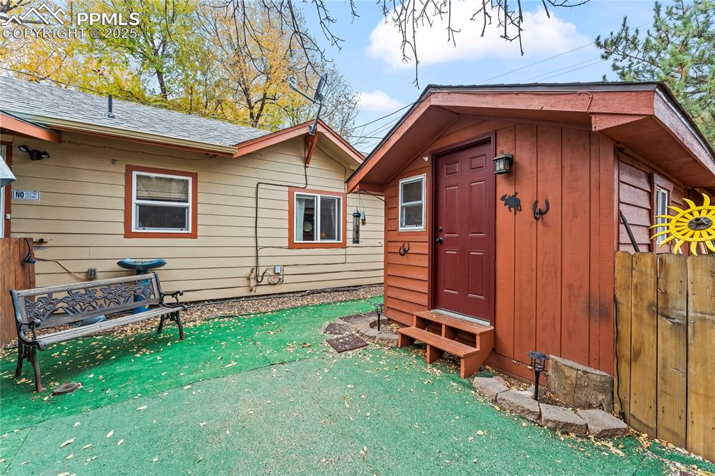521 Brookside Street Colorado Springs, CO 80905 - Photo 24 of 27 a backyard of a house with barbeque oven