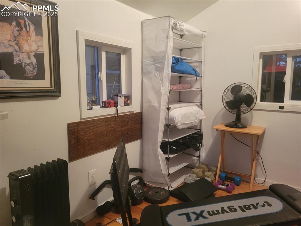 521 Brookside Street Colorado Springs, CO 80905 - Photo 25 of 27 a living room with furniture and a piano