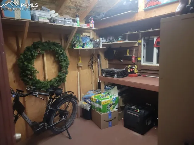 a front view of a house with outdoor seating