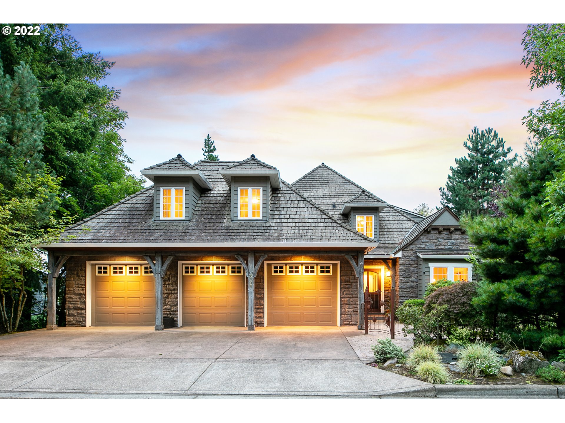 a front view of a house with yard
