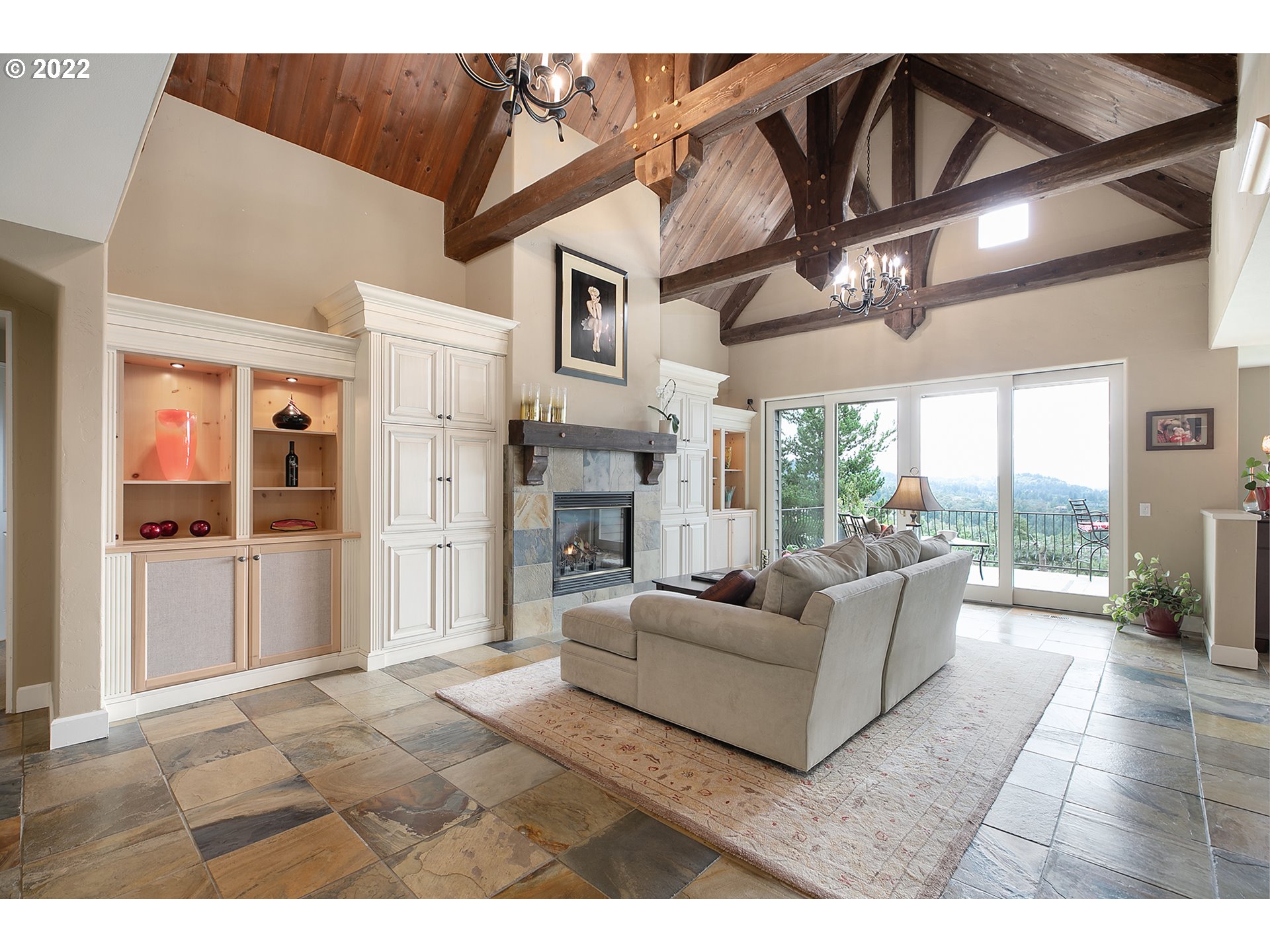 4027 Northwest Devoto Lane Portland, OR 97229 - Photo 10 of 48 a living room with furniture and a fireplace